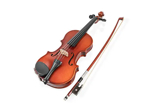 Photo of Violin and bow on white