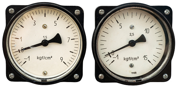 Two old meters isolated on white. Clipping path included.