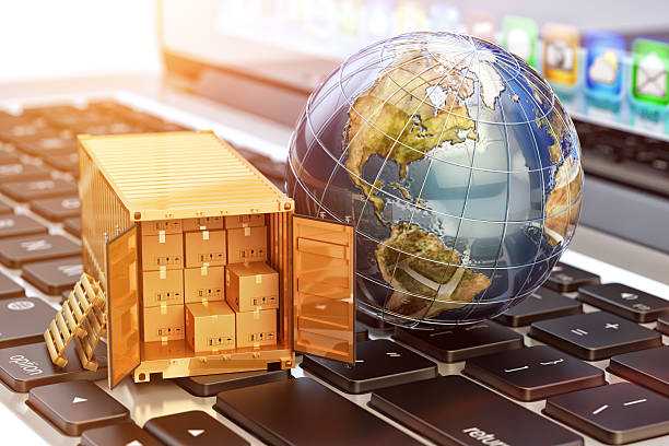 Internet shopping and e-commerce, package delivery concept Global freight transportation business, cargo container with cardboard boxes and Earth globe on laptop globalization stock pictures, royalty-free photos & images