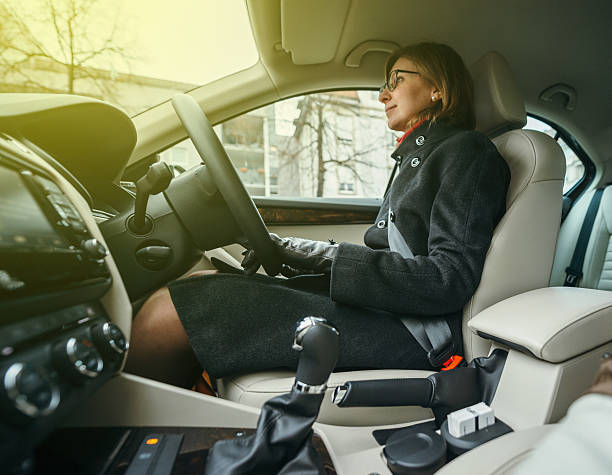 confident businesswoman driving toward success right hand - driving car drive women imagens e fotografias de stock