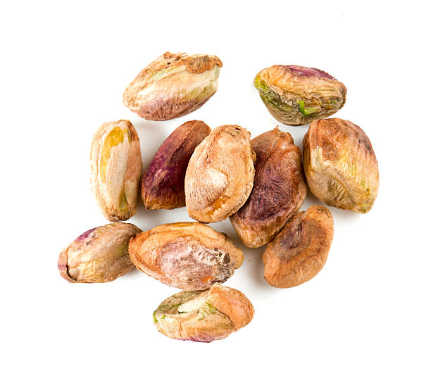 istock heap of pistachio isolated on white 637376522