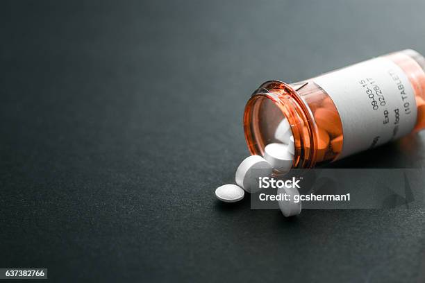 Pill Bottle Spilling Out Pills Stock Photo - Download Image Now - Prescription Medicine, Pill, Medicine