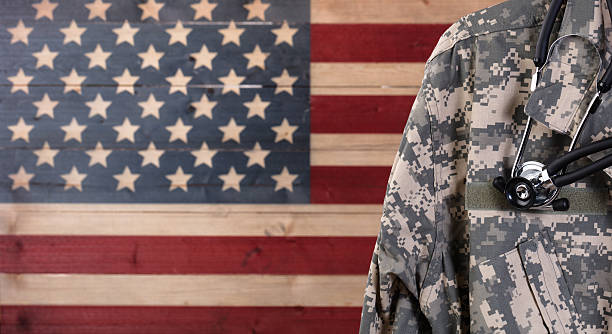 istock Close up of military uniform jacket and stethoscope with rustic 637383102