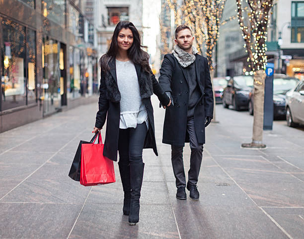 istock Excited woman going shopping with sad husband 637383738