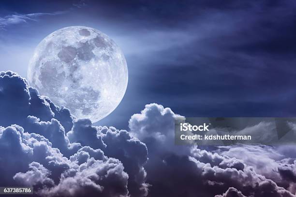 Nighttime Sky With Clouds And Bright Full Moon With Shiny Stock Photo - Download Image Now