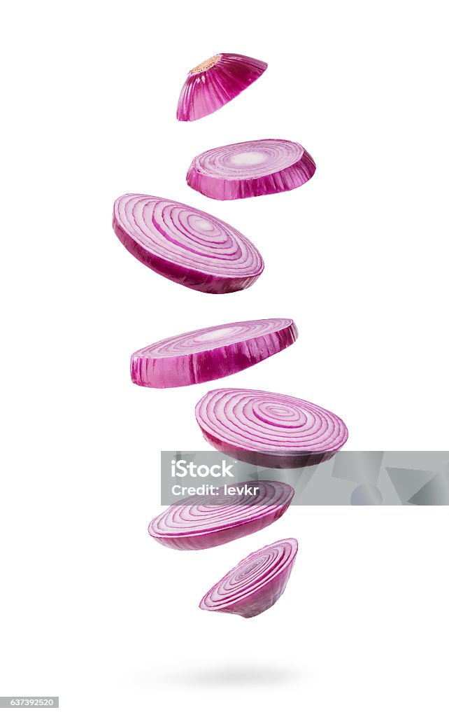 sliced  red onion sliced and falling  red onion isolated on white background Onion Stock Photo