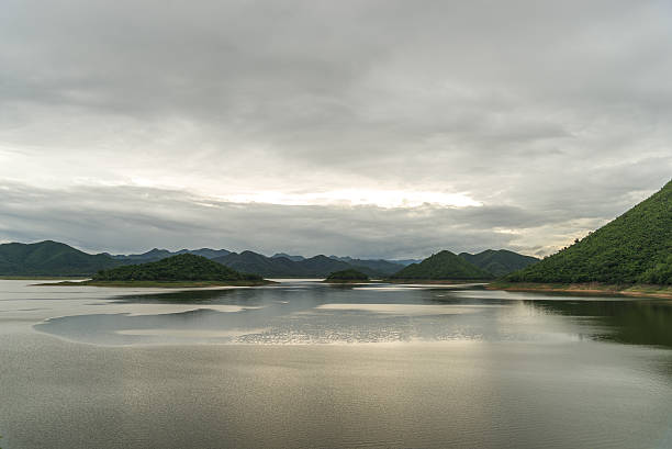 istock landscape with mountains trees and a river in front 637392714