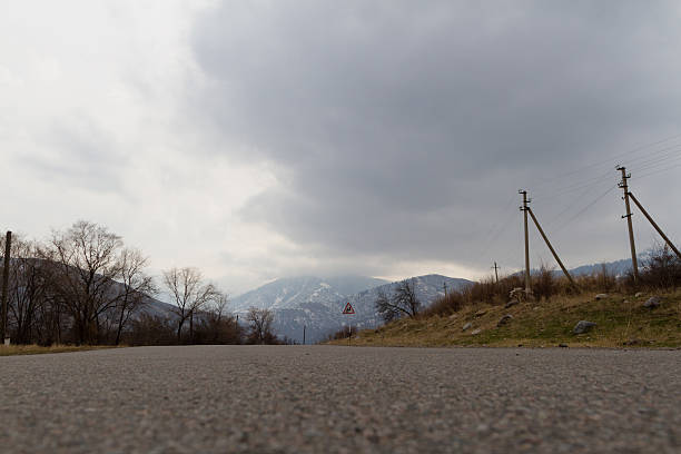 istock road in mountains with a dangerous turn 637394994