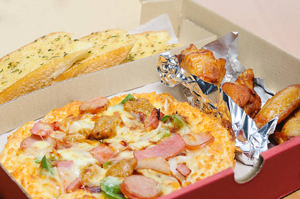 istock Pizza box set, garlic bread and chicken 637395426