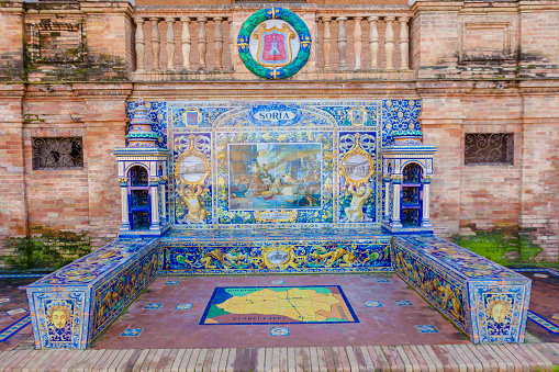 Glazed tiles bench of spanish province of Soria at Plaza de Espana, Seville, Spain
