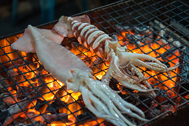 istock Grilled Squid in the market 637397888
