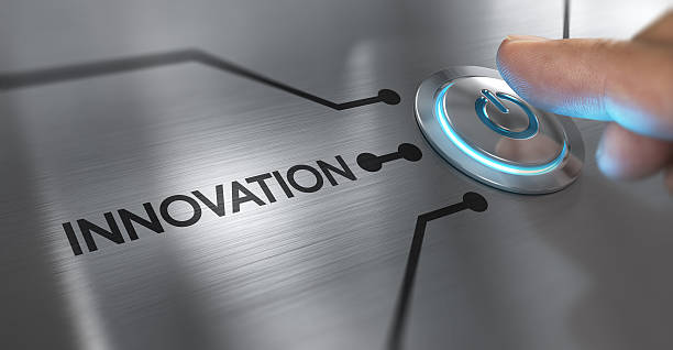 Innovation Concept Finger about to press a start button with the word innovation on the left. Composite between an image and a 3D background innovation stock pictures, royalty-free photos & images