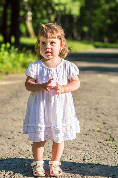 istock little girl walks in the Park 637407678