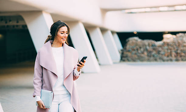 istock Happy woman talking on the phone 637408374