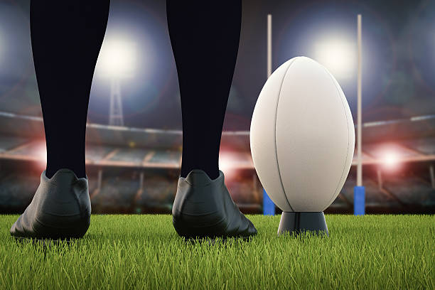 istock rugby ball with rugby posts on field 637414698