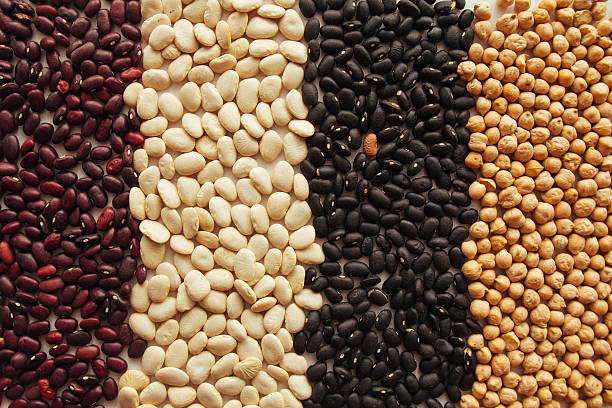 istock Chickpeas, red, lima and black beans top view 637415028