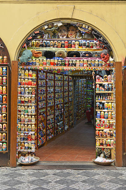Czech Republic_Prague Prague, Bohemia, Czech Republic - December 3, 2015: Shop with souvenirs and Babushkas puppets with different outlooks babuska stock pictures, royalty-free photos & images