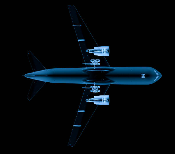 istock x ray airplane on black background 637416724