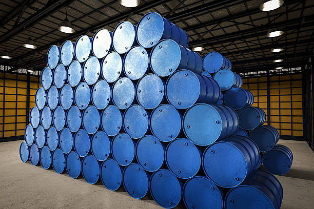 istock heap of blue barrels 637422542