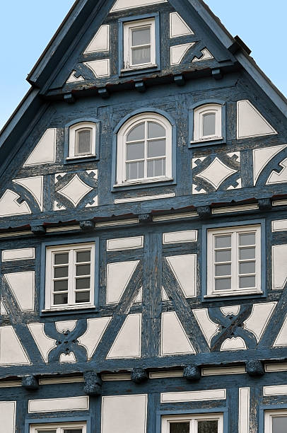 istock Front view of a typical half-timbered house with dark  frame. 637422960