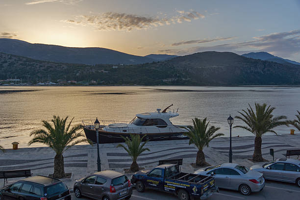 Argostoli, Kefalonia, Greece, May 26  2015:  Sunrise view of Argostoli Argostoli, Kefalonia, Greece - May 26  2015:  Sunrise view of Embankment and port of Argostoli, Kefalonia, Ionian islands, Greece lixouri stock pictures, royalty-free photos & images