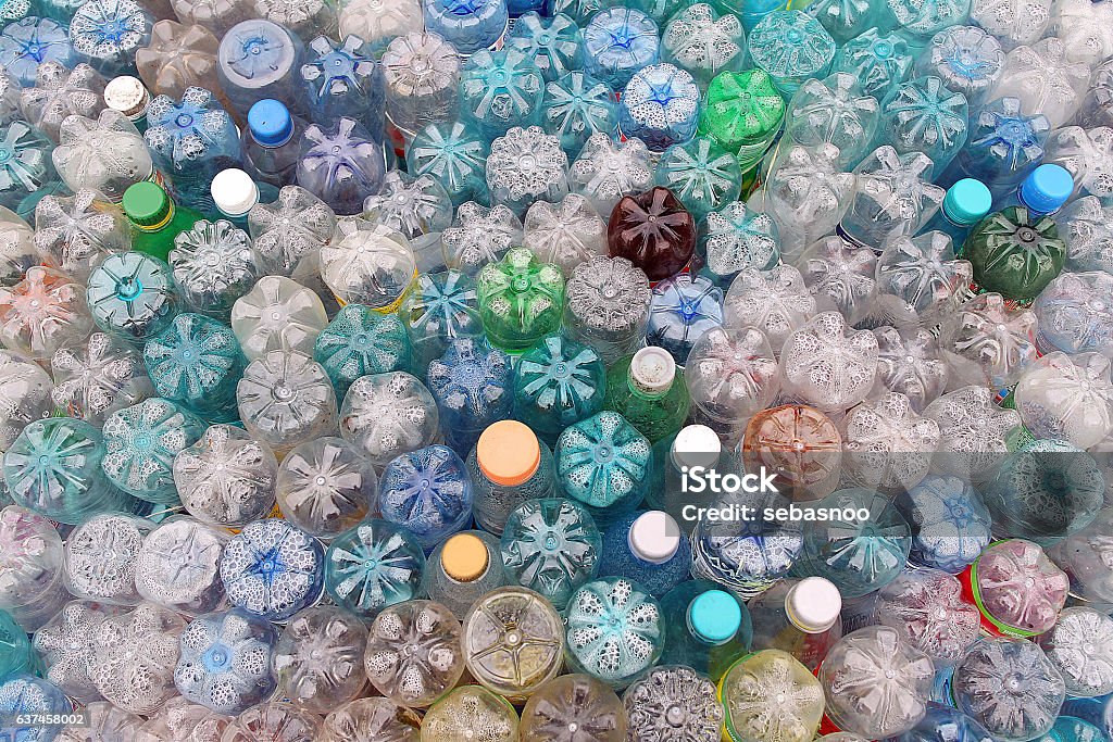Dirty used colored plastic bottle pile Dirty used colored plastic bottle pile. Pets Stock Photo