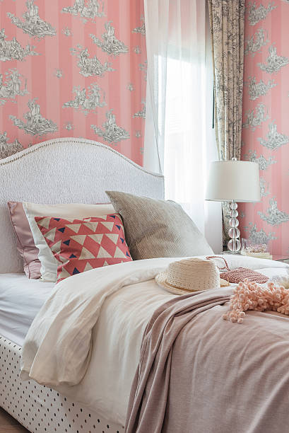 istock pink color tone bedroom with classic bed style 637470200