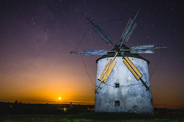 istock Scenic nightscape of old wind miill. 637481420