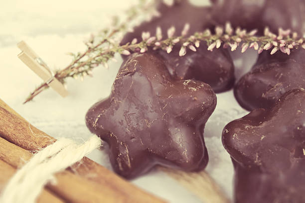 istock Chocolate gingerbread cookies on the wooden background 637482094