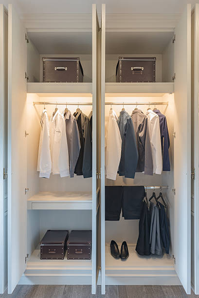 istock black and white color tone clothes hanging on rail 637482108