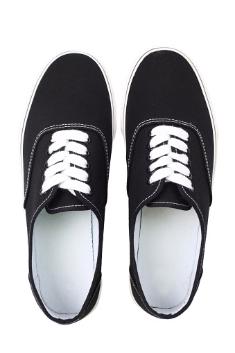 Black canvas sneakers, Top view, isolated with clipping path