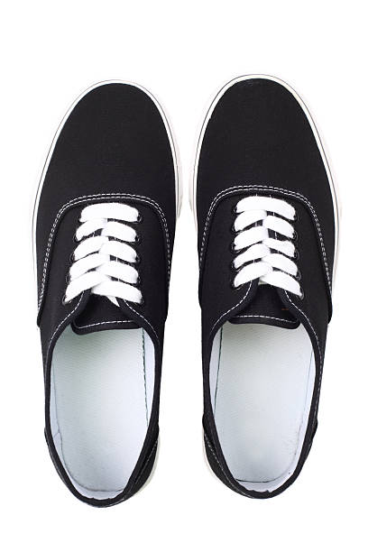 Black canvas sneakers, Top view stock photo