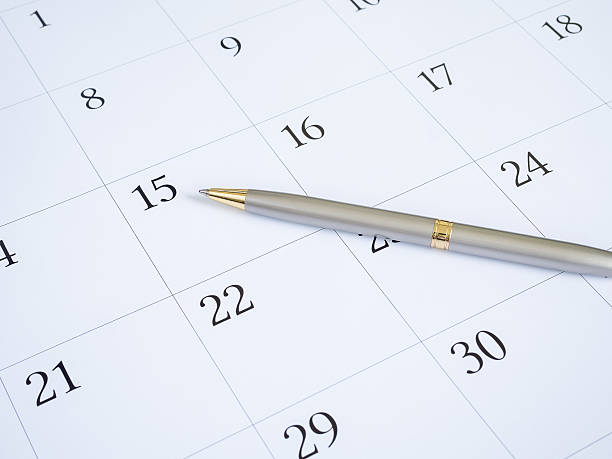 istock Pen put on calendar desk 637493142