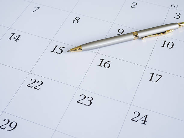 istock Pen put on calendar desk 637493410