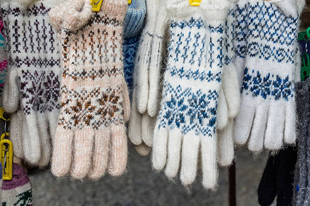 istock Bunch of handmade colorful woolen gloves 637495132
