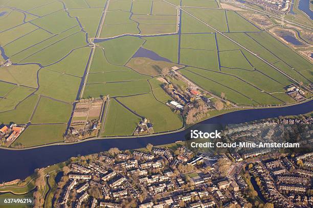 Dutch Landscape With Village Green Fields And Canal Stock Photo - Download Image Now