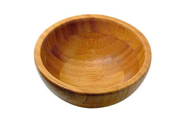 istock Wooden bowl isolated on white 637498910