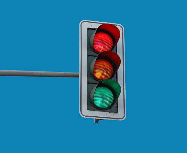 traffic light At a traffic light the three colors light up red, yellow and green at the same time. stoplight stock pictures, royalty-free photos & images