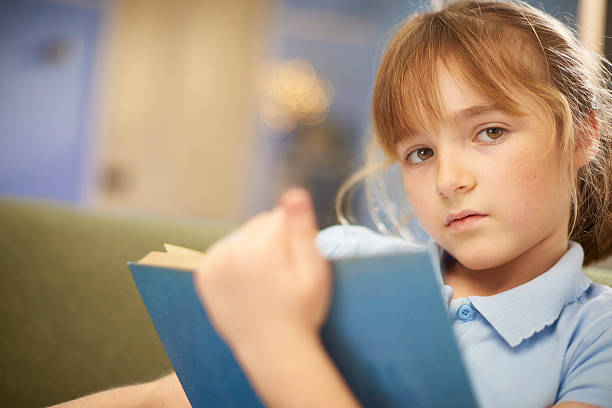 istock schoolgirl portrait 637505134