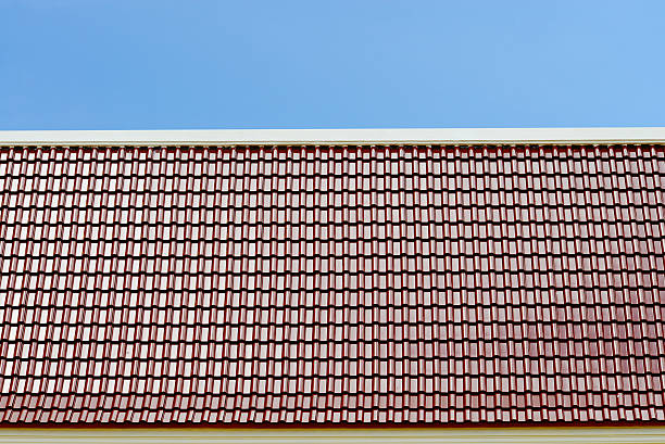 istock roof and blue sky 637514764