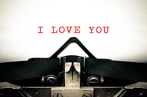 typewritter avec la phrase i love you - typewriter typebar retro revival old photos et images de collection