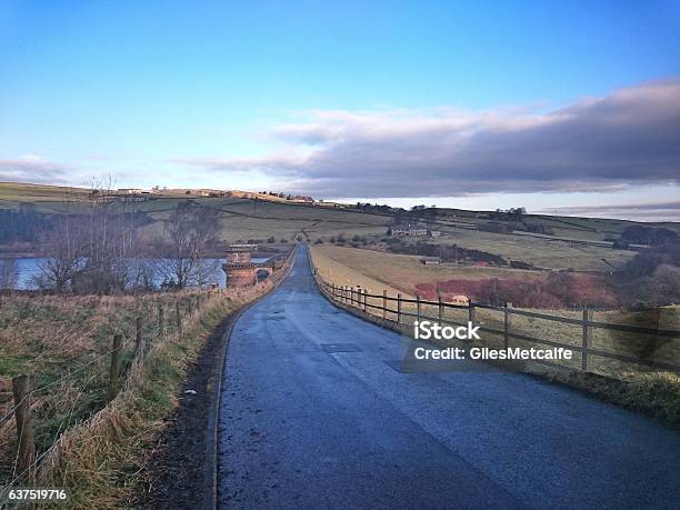 Digley Reservoir And Road West Yorkshire Stock Photo - Download Image Now - Asphalt, Country Road, Extreme Terrain