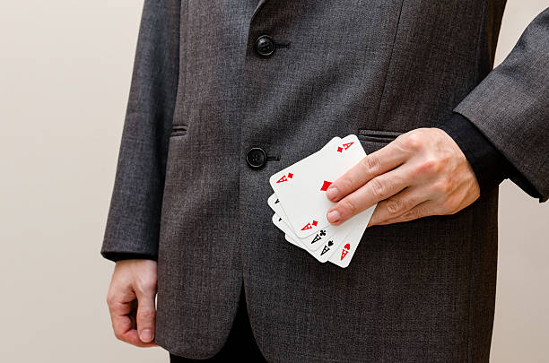 istock businessamen with aces in the sleeve 637520020