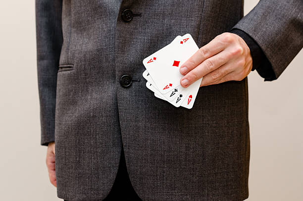 istock businessamen with aces in the sleeve 637520550