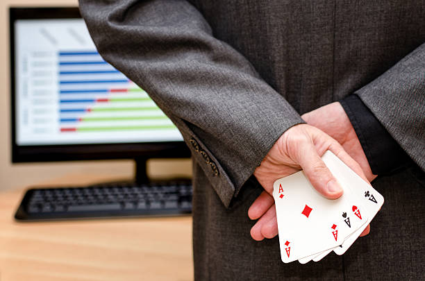 istock businessamen with aces in the sleeve 637520770