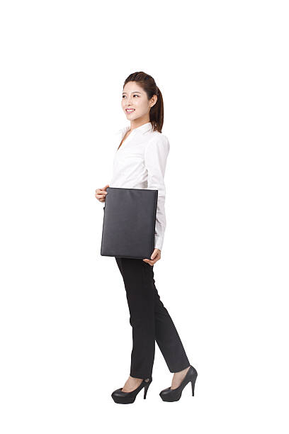 istock Businesswoman holding a portfolio 637523350