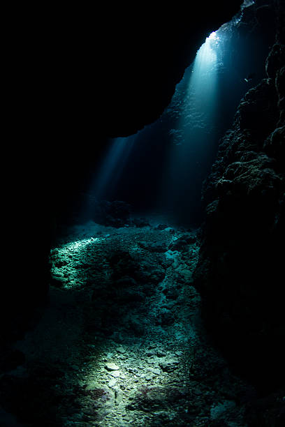 istock Underwater Cavern and Beams of Light 637525456