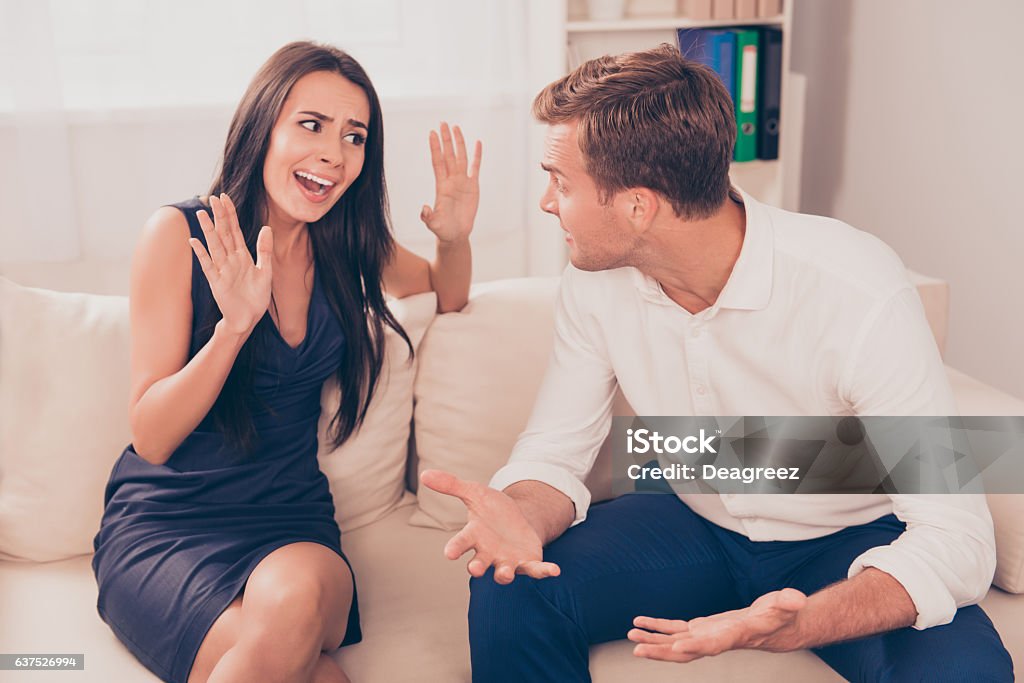 Two young lovers quarreling because of disagreements Arguing Stock Photo