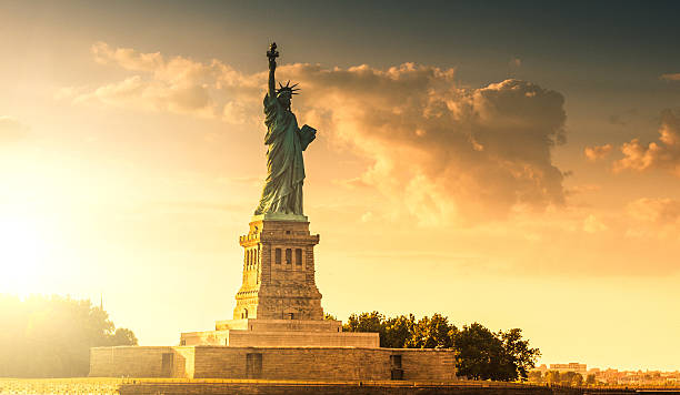 Statue of Liberty - New York City Statue of Liberty and New York City skyline statue of liberty new york city photos stock pictures, royalty-free photos & images