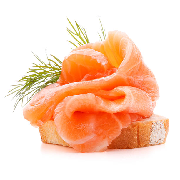 istock sandwich or canape with salmon on white background  cutout 637527744